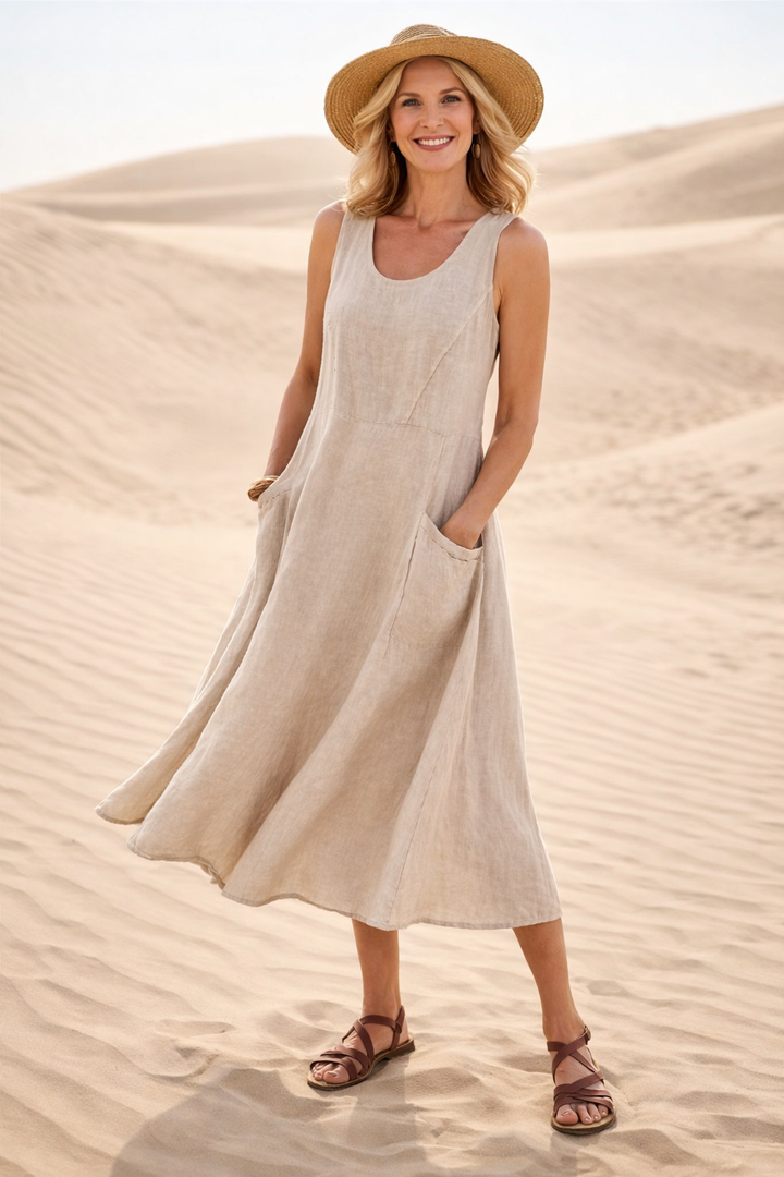 Pink A-line midi dress for women. Sleeveless, comfortable, and casual, ideal for effortless daily fashion.