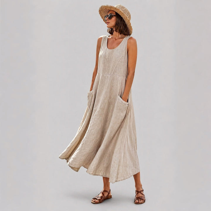 Comfortable women's summer A-line midi dress, sleeveless with pockets, perfect relaxed fit for casual everyday.
