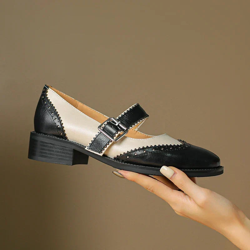 Vintage-style brown leather Mary Janes for women. Comfortable flat shoes with a charming buckle strap design.