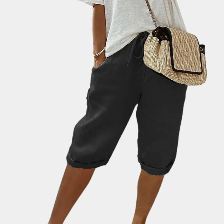 Women's comfortable elastic waist summer shorts with pockets, ideal for casual wear, beach, or loungewear.