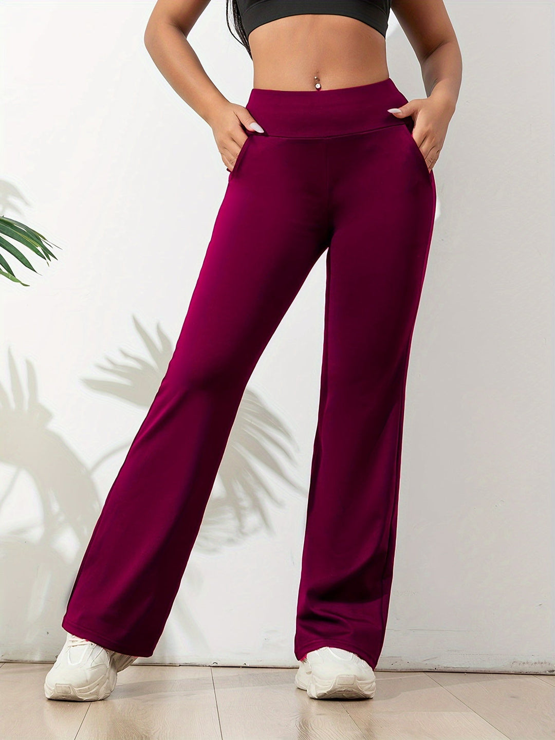 Flared yoga pants for women, comfortable & high-waisted, suitable for studio, gym, or casual use.