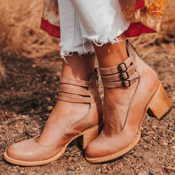 Comfortable women's summer footwear, featuring soft, adjustable straps and a durable flat sole.