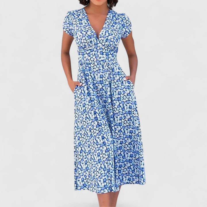 Women's comfortable flowy midi dress, perfect for casual elegant everyday wear. Versatile summer fashion.