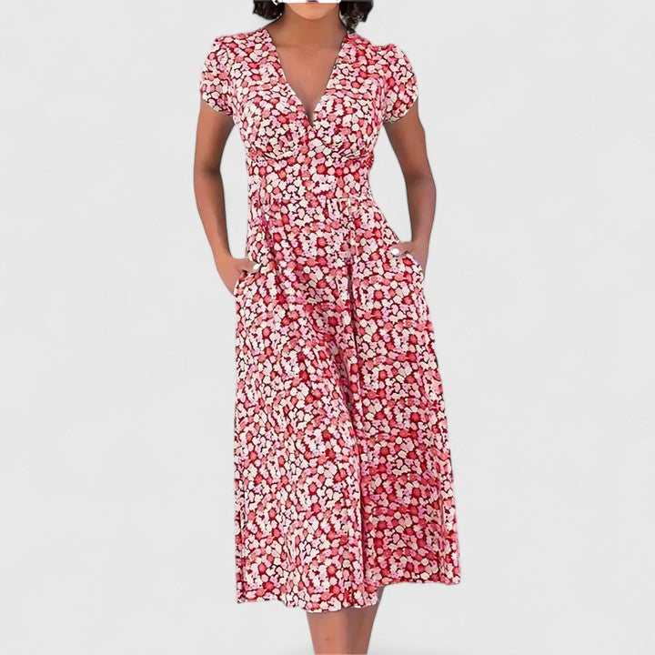 Lightweight women's flowy midi dress, comfortable for everyday wear. Elegant and versatile summer fashion.