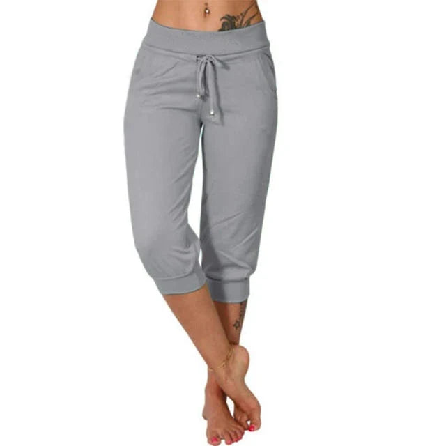 Soft women's knee-length capris, offering a comfortable & relaxed fit for daily fashion.
