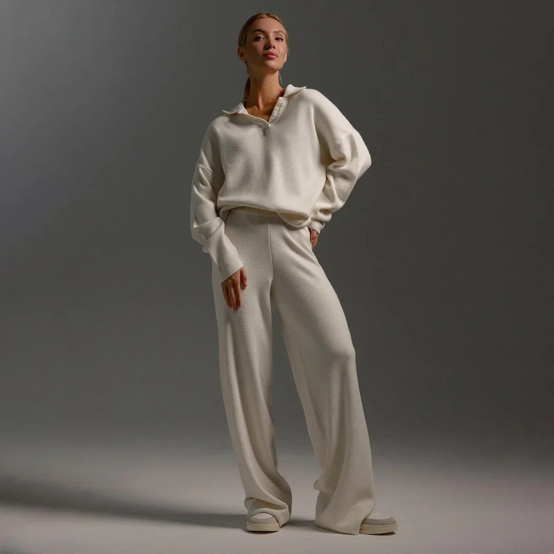 Stylish women's two-piece knit tracksuit featuring a cozy polo-neck sweater & fashionable wide-leg pants.