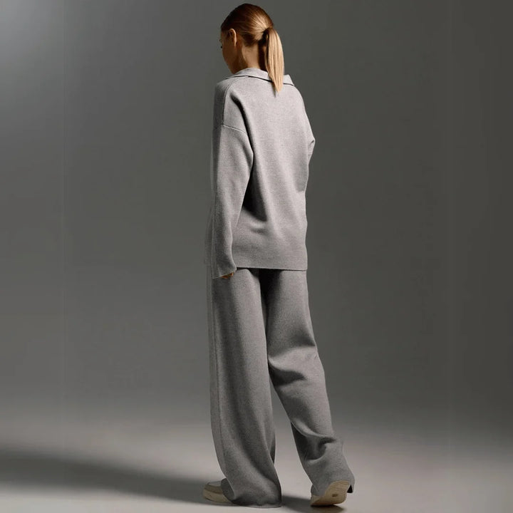Elegant women's knit sweater set: chic polo-neck top & wide-leg pants. Perfect for casual comfort & style.