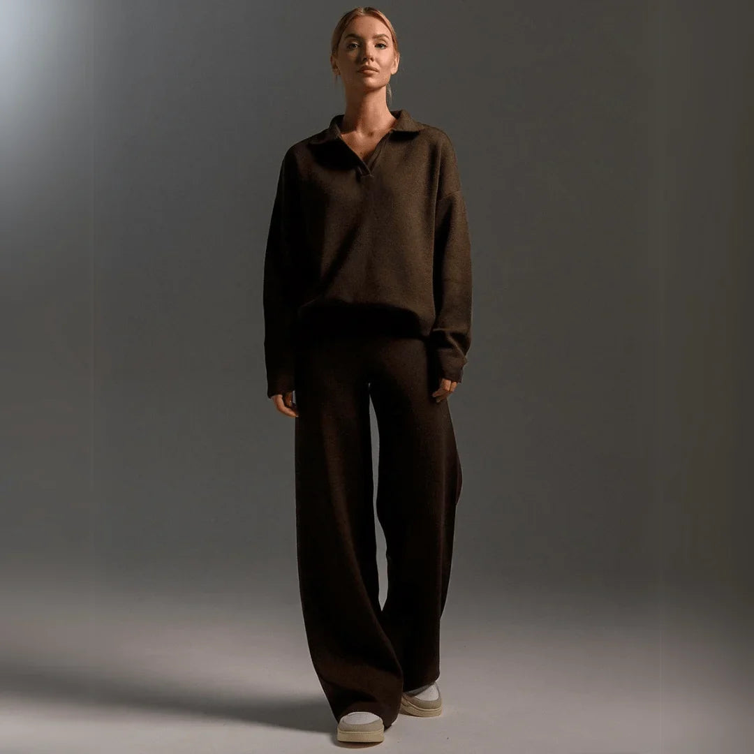 Women's comfortable knit loungewear set; a warm polo-neck sweater & stylish wide-leg trousers for relaxing.