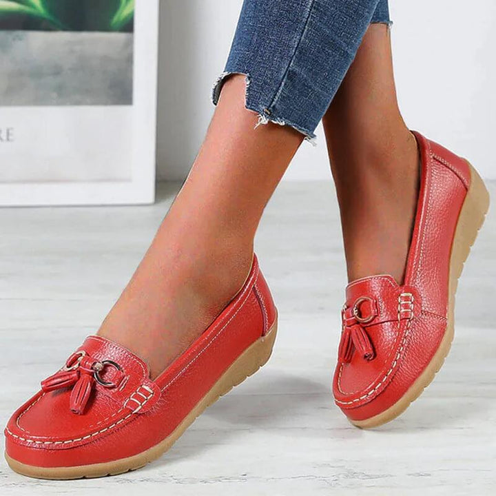 Ladies' elegant & comfortable leather slip-on loafers, versatile footwear for any occasion.