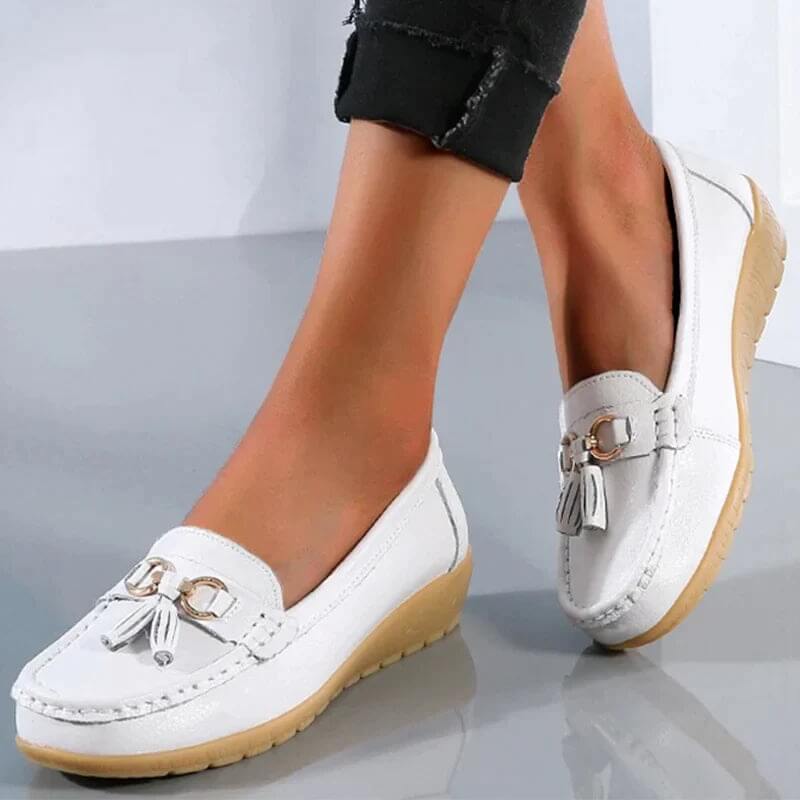 Comfortable women's leather slip-on loafers, merging timeless style with everyday functionality.