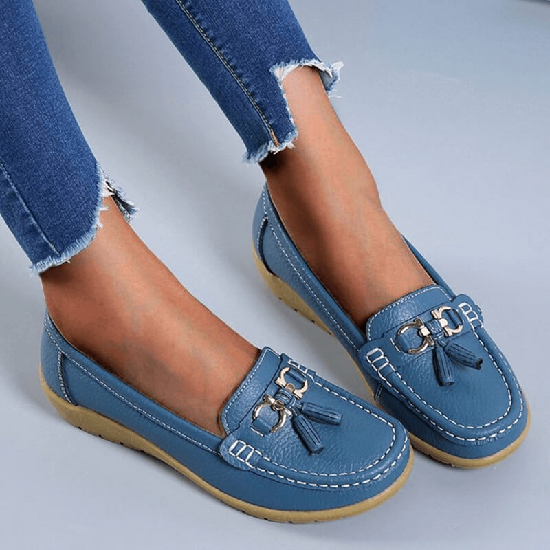 Elegant ladies' leather slip-ons, offering comfortable fit for casual or workwear style.