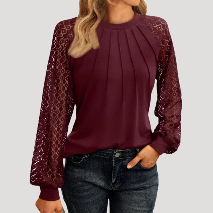 Stylish women's versatile long sleeve top, perfect for layering or stand-alone wear.
