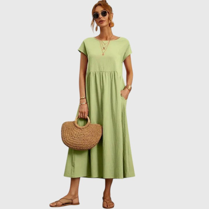 Everyday women's casual midi dress with pockets, offering a comfortable and flowy fit.