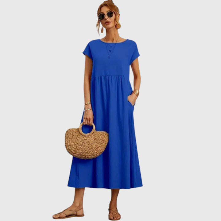 Chic short-sleeve midi dress, ideal for women seeking comfort and style with pockets.