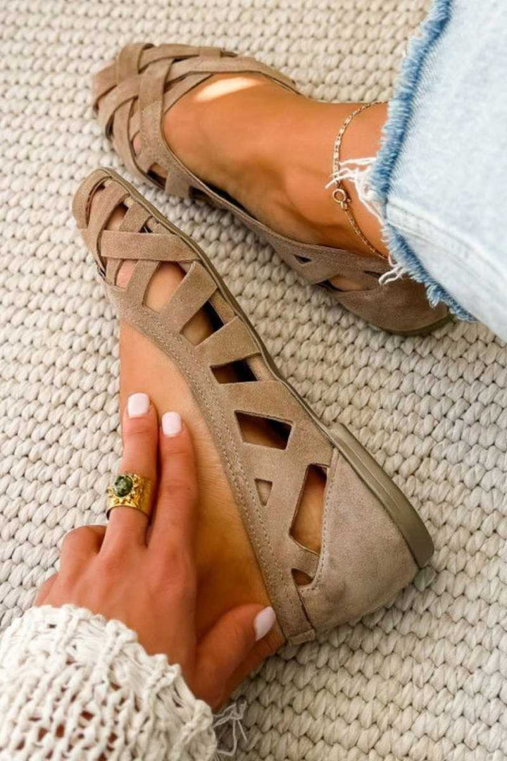 Women's flat cross-strap sandals, open toe comfort for elegant summer casual footwear.