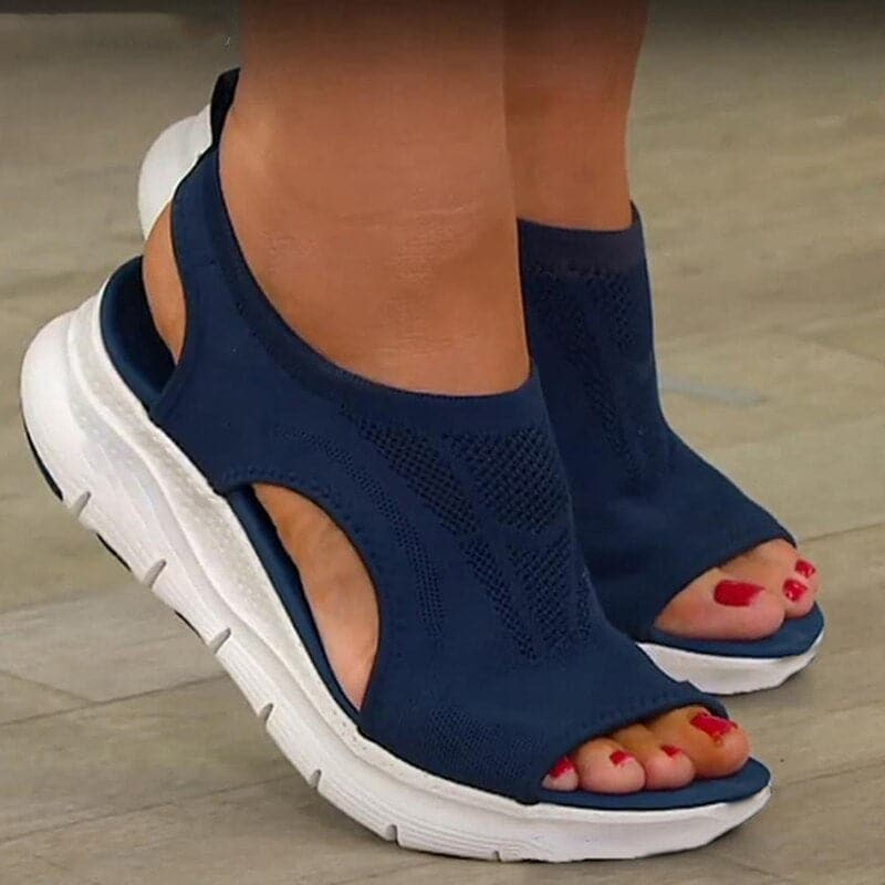 Women's comfortable open-toe spring sandals. Versatile slip-on casual footwear for everyday style.