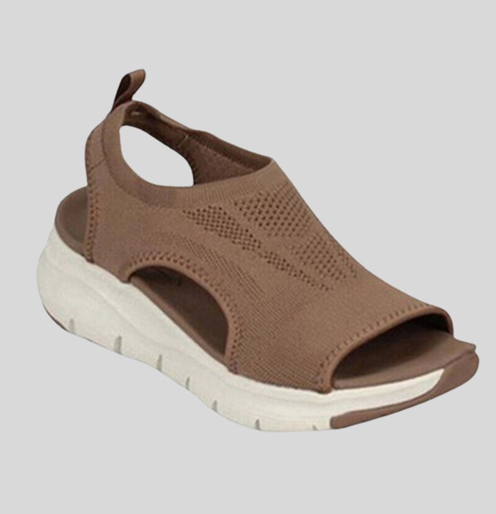 Casual women's open-toe spring sandals. Comfortable everyday slip-on footwear, perfect for summer style.