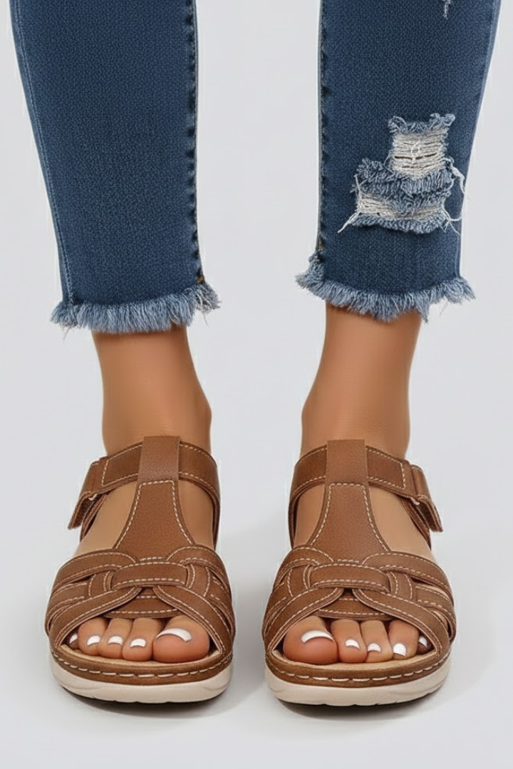 Stylish women's black open toe flat strap sandals, ideal for versatile summer fashion & comfort.
