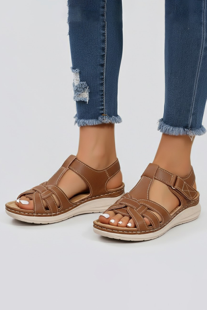 Comfortable women's open toe strap sandals, essential versatile summer shoes for casual wear.