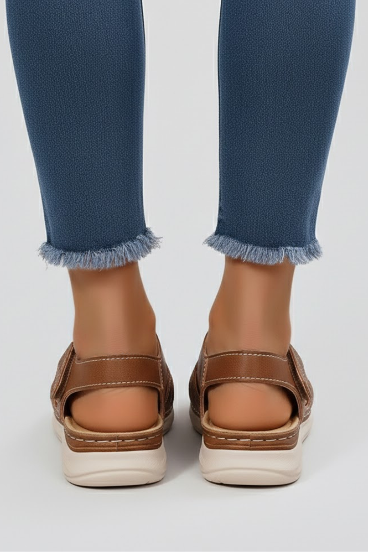 Fashionable women's open toe flat sandals with multiple straps, perfect for summer comfort & style.