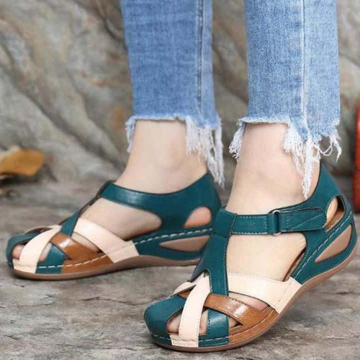Stylish women's slip-on open-toe sandals with comfort design and adjustable straps for summer.