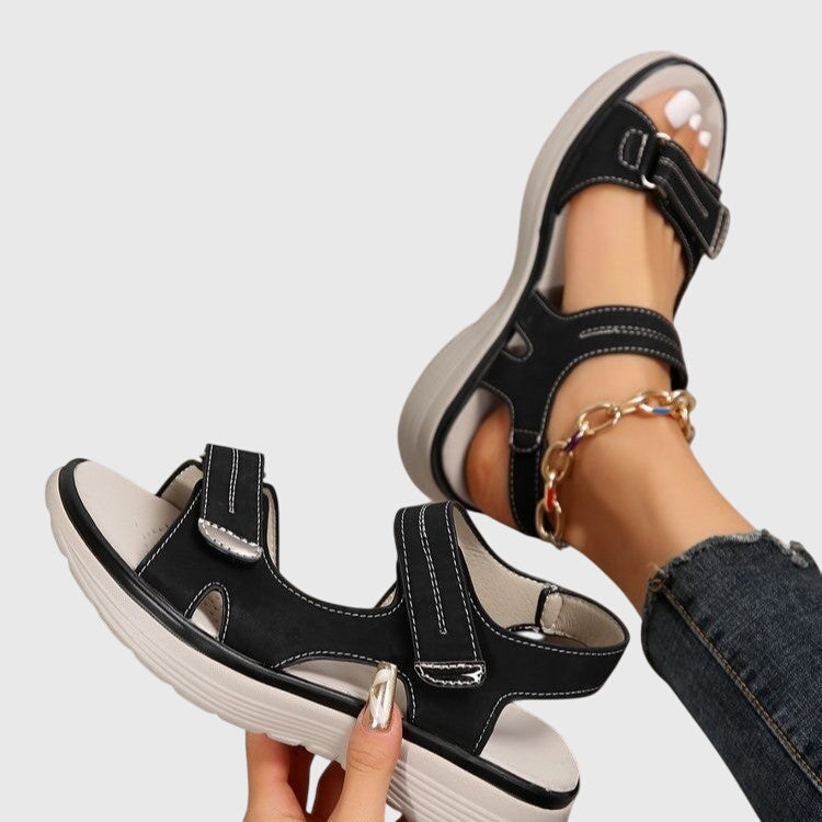 Supportive women's sandals featuring arch support, ideal for comfortable walking & foot health.