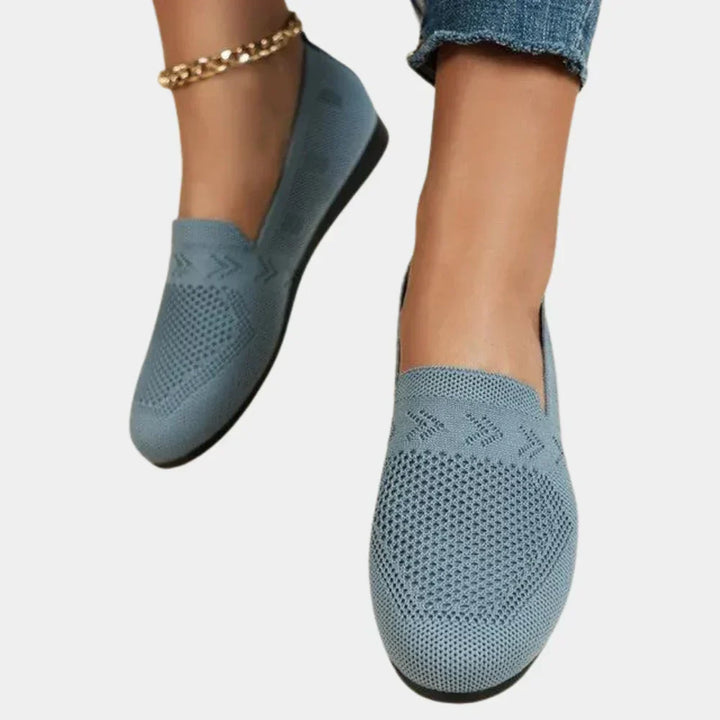 Easy slip-on women's walking flats with orthopedic comfort, perfect for daily wear & foot support.