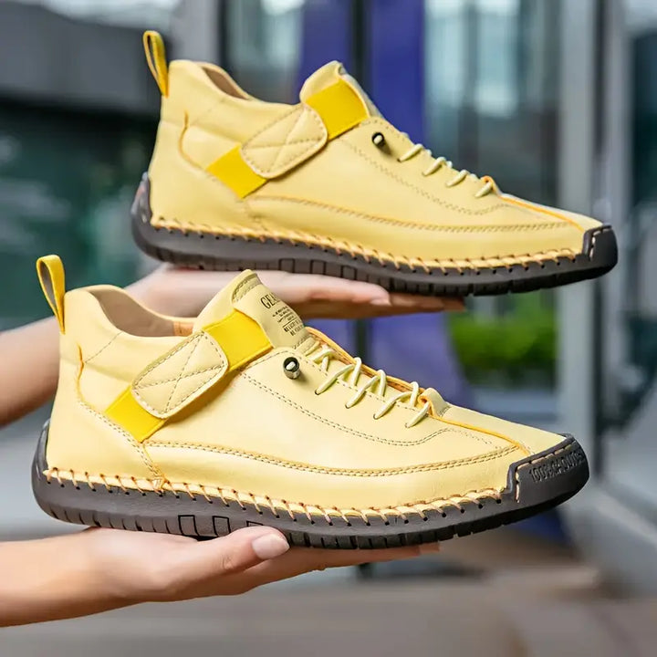 Neutral-colored women's orthopedic sneakers with essential arch support for daily comfort.