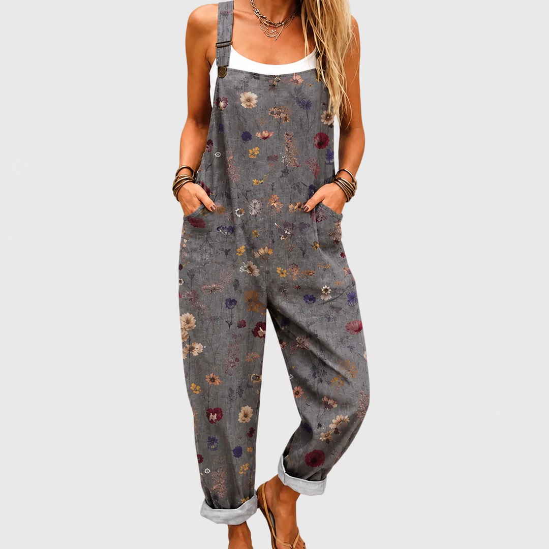 Women's comfortable printed jumpsuit with loose fit, wide leg, & adjustable straps, perfect for casual summer style.