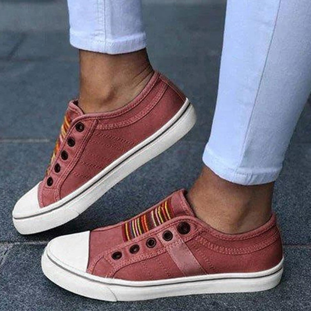 Women's comfortable red slip-on casual shoes for easy everyday wear and versatile style.