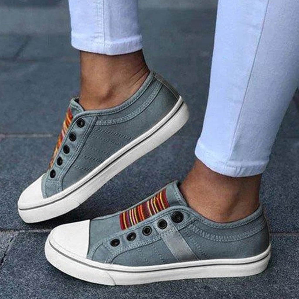 Stylish green women's flat slip-on shoes, perfect for casual outfits and all-day comfort.