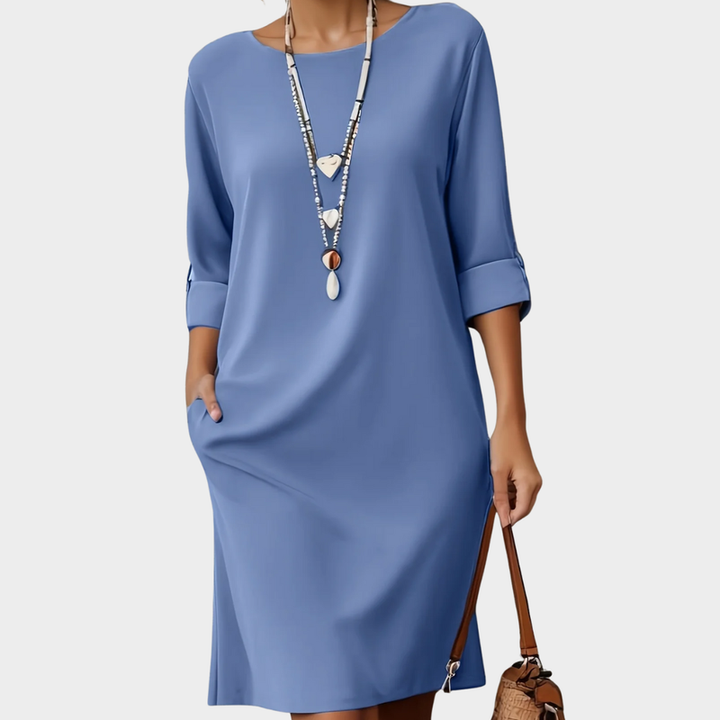 Women's comfortable round neck midi dress. Everyday elegant slip-on casual fashion.