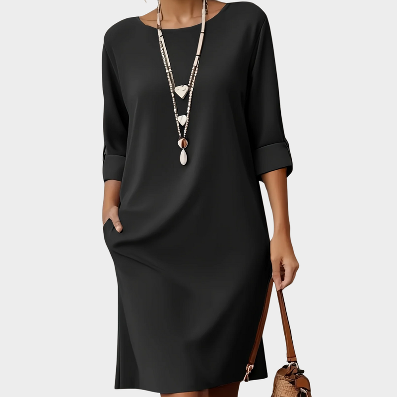Versatile women's round neck dress, perfect for everyday comfort & style. Midi length.