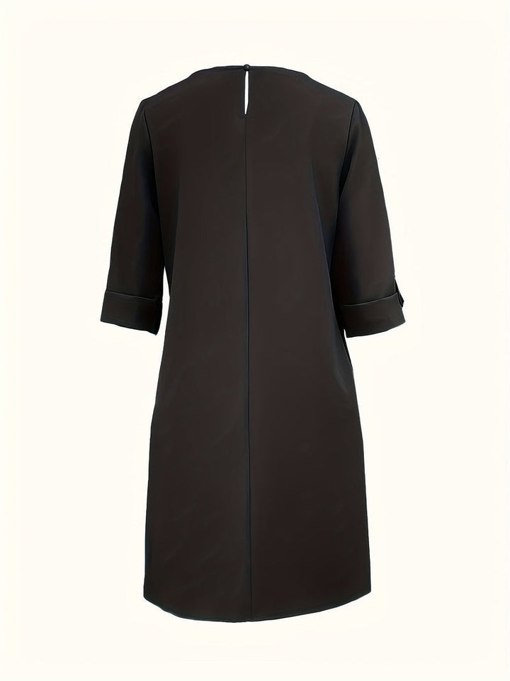 Fashionable women's round neck midi dress, offering everyday comfort and versatile style.