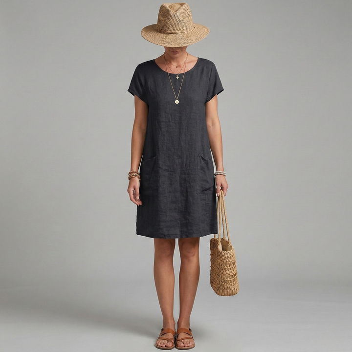 Short sleeve mini dress for women featuring convenient pockets, great for a comfortable summer casual look.