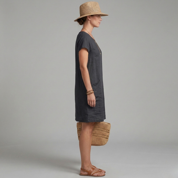 Lightweight women's summer mini dress with short sleeves and pockets, perfect for vacation or everyday comfort.