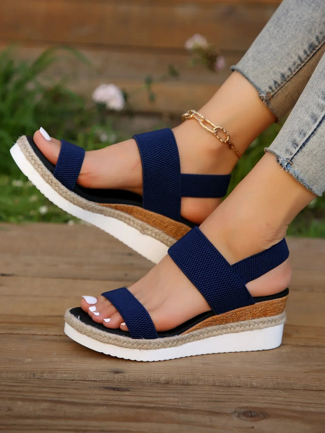Women's comfortable slip-on flat sandals, ideal casual summer footwear. Open-toe design for everyday wear.