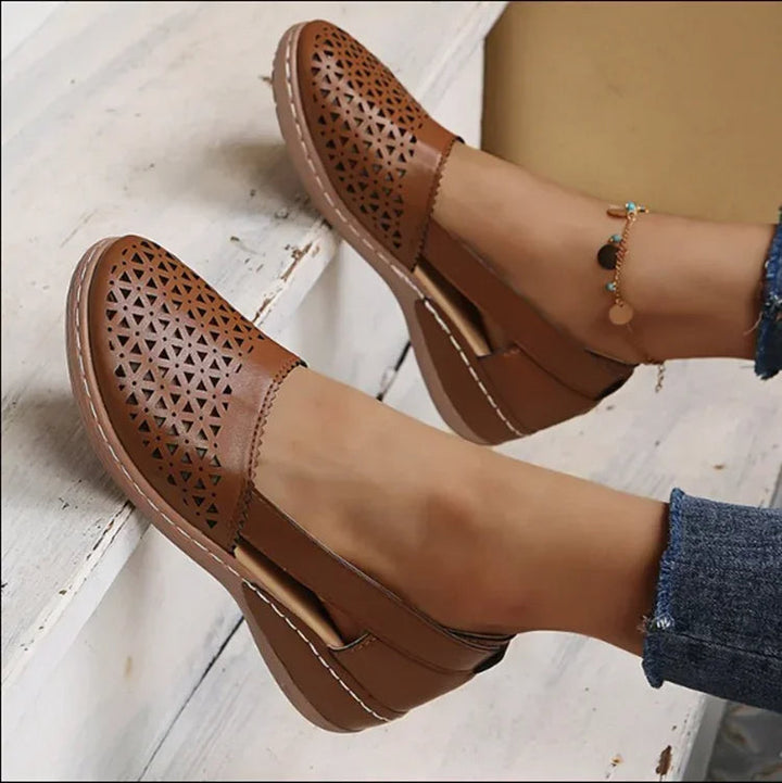 Women's comfortable slip-on wedge sandals, perfect for summer style. Ideal for casual elegant looks.