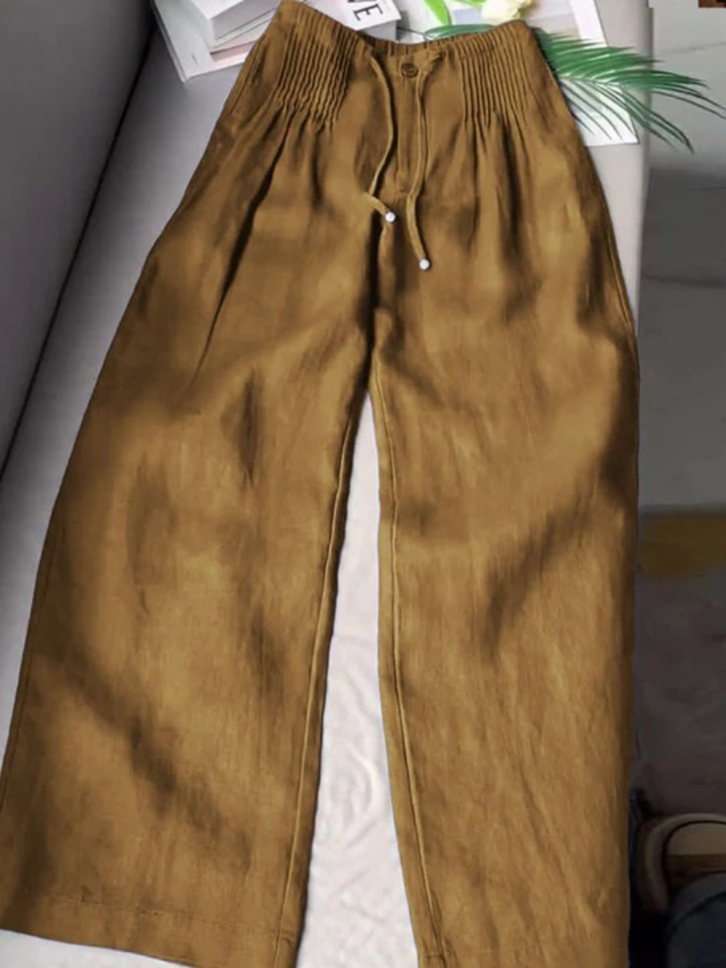 Pull-on straight leg trousers for women, featuring a comfortable drawstring waist. Versatile full-length design.