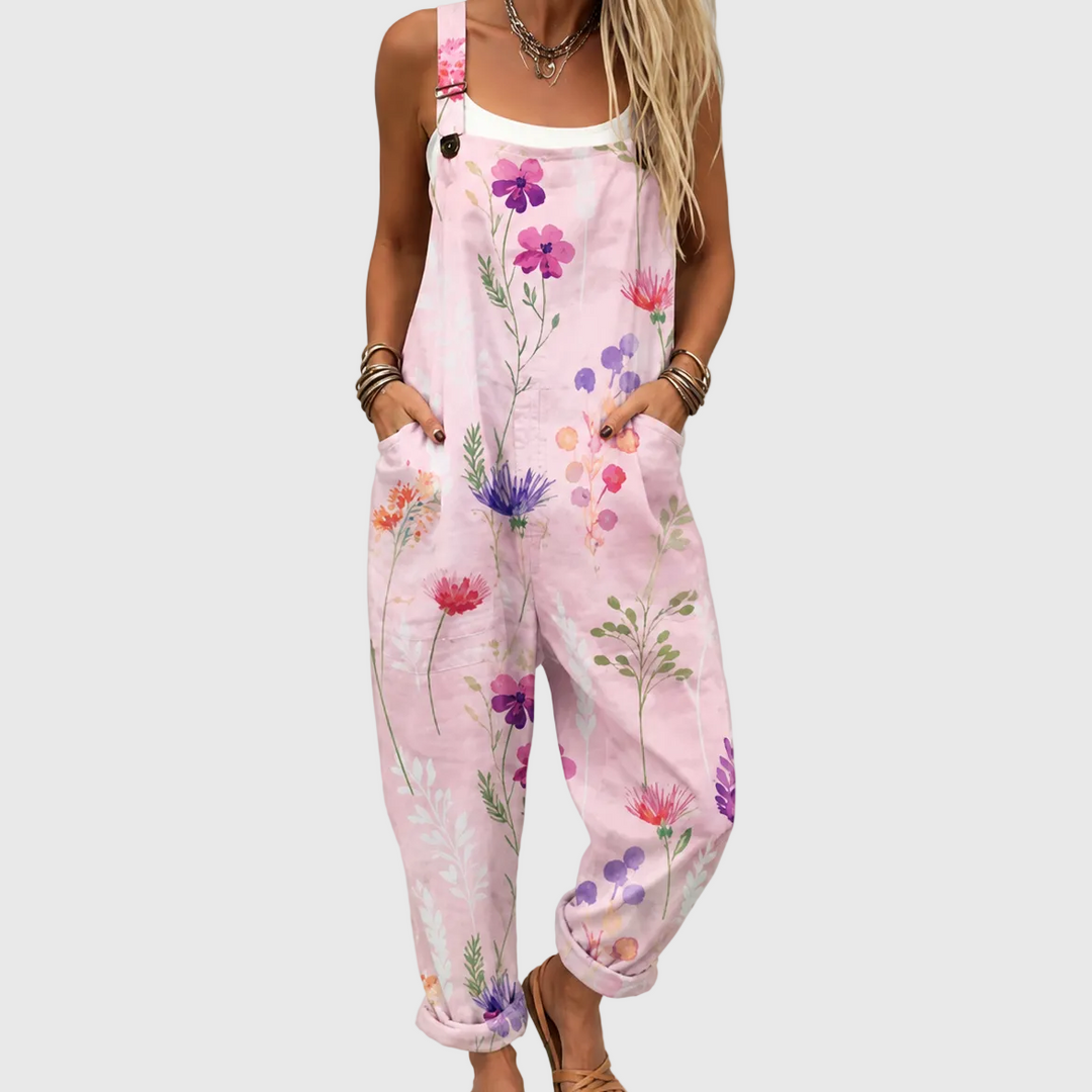 Women's comfortable & stylish pink floral overalls with adjustable straps, perfect for spring casual wear.