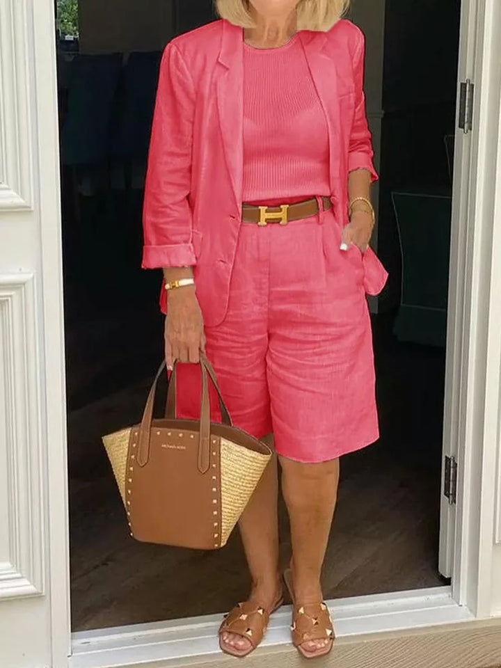 Stylish women's summer two-piece outfit featuring a light jacket & shorts, perfect for casual elegance.