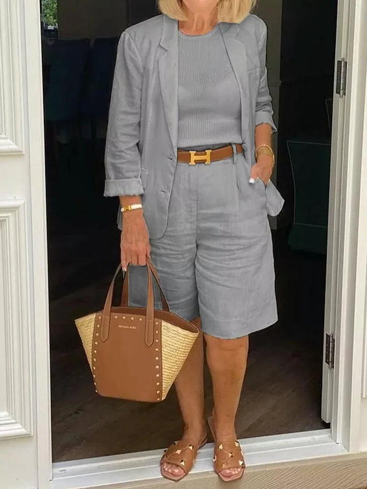 Women's elegant summer two-piece set: comfortable shorts & a stylish jacket for a versatile casual outfit.