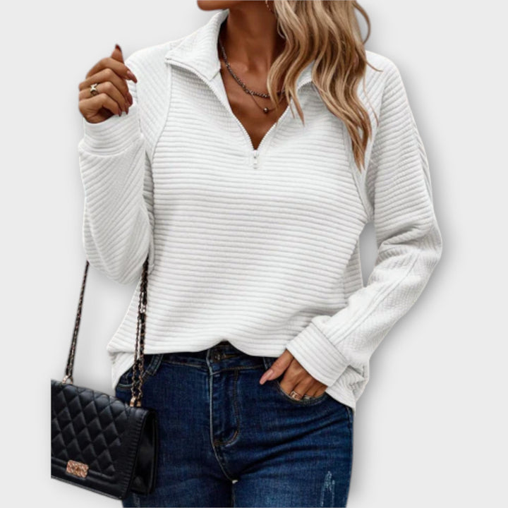 Elegant women's V-neck jumper, a versatile long sleeve knitwear pullover for both casual and stylish outfits.