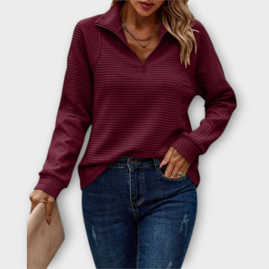 Versatile women's V-neck fashion jumper, a comfortable long sleeve pullover knitwear for stylish outfits.