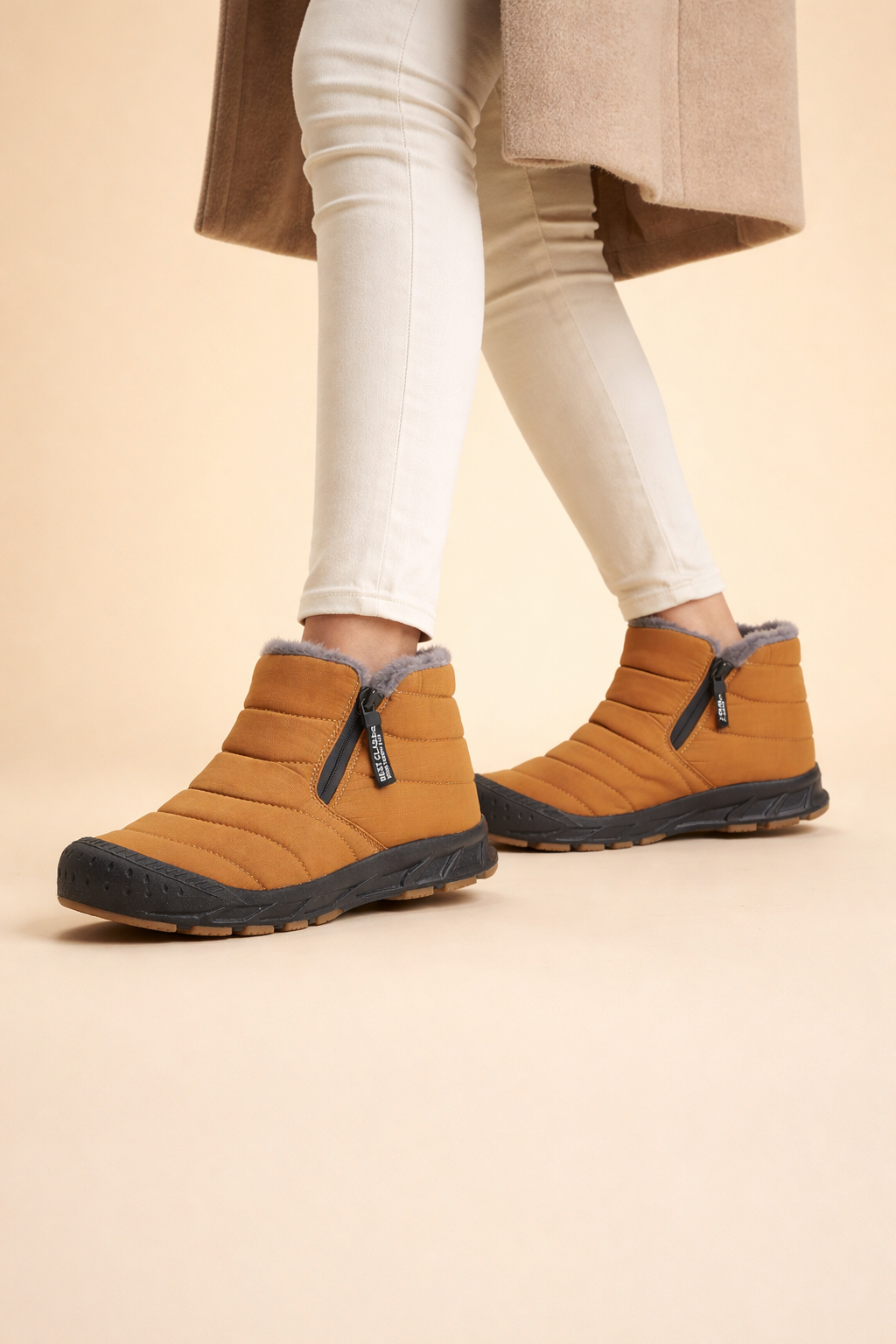 Waterproof women's winter boots, designed to keep feet dry and warm in snowy conditions.