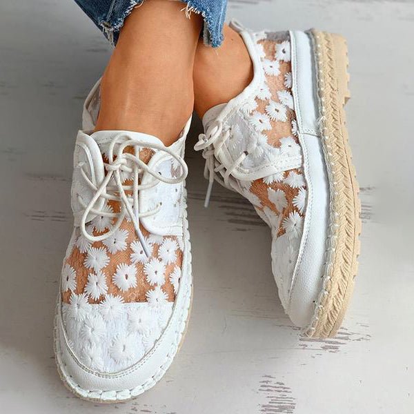 Stylish women's embroidered sneakers for casual wear. Enjoy comfort & a chic look for daily activities.