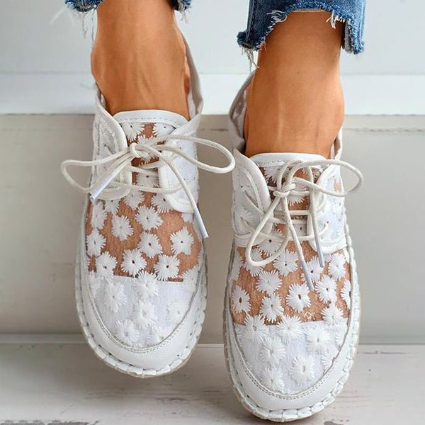 Embroidered women's casual sneakers. Enjoy comfortable, stylish footwear for everyday versatility.