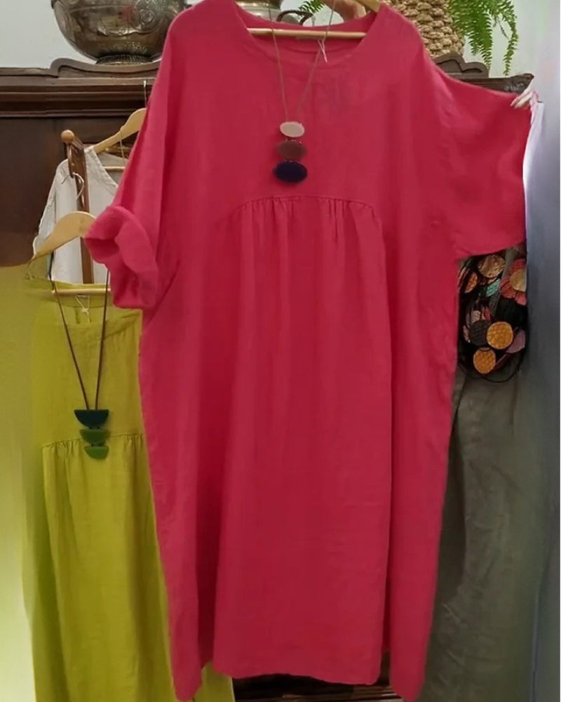 Casual women's wide summer dress, comfortable & flowy, flattering knee-length design for everyday wear.