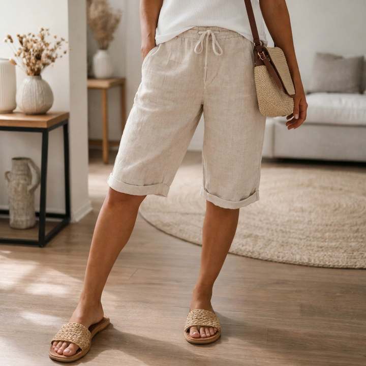 Women's comfy Bermuda shorts with adjustable drawstring for a relaxed, knee-length summer look.