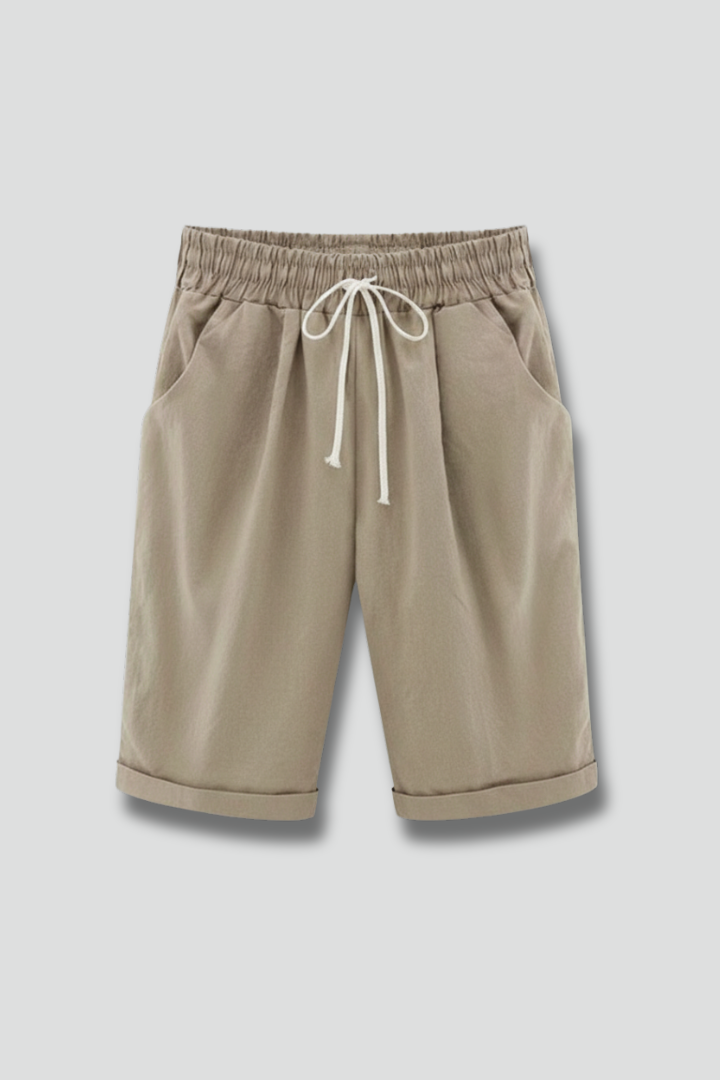 Women's comfy black drawstring shorts with side pockets, ideal for casual summer wear.